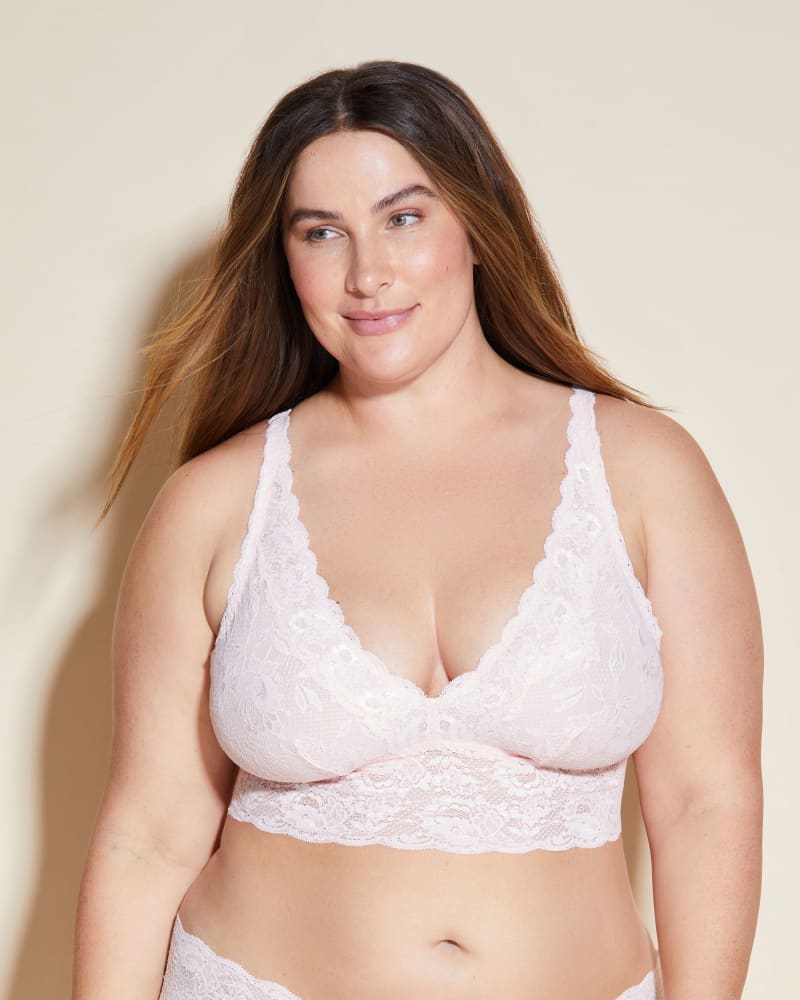 Front of a model wearing a size 1X Plungie Longline Lace Bralette in Pink Lilly by Cosabella. | dia_product_style_image_id:274442